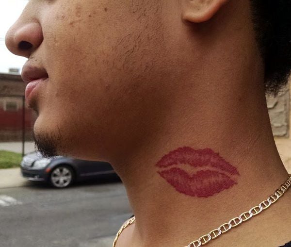 Lip Tattoo On Neck Meaning