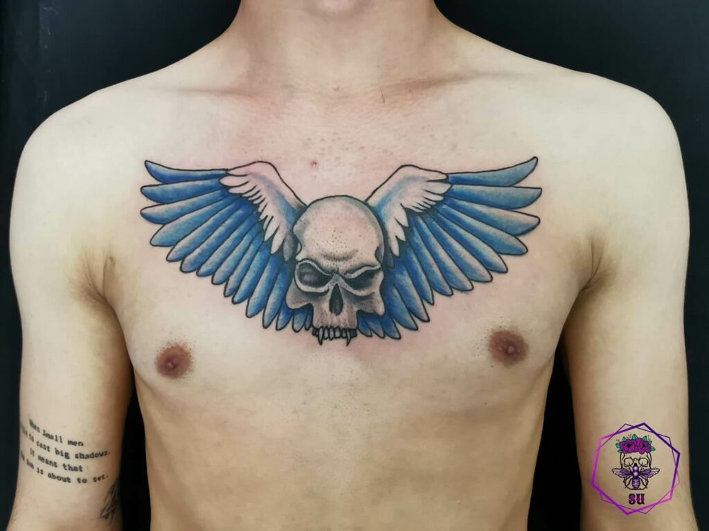 Wing On Chest Tattoo